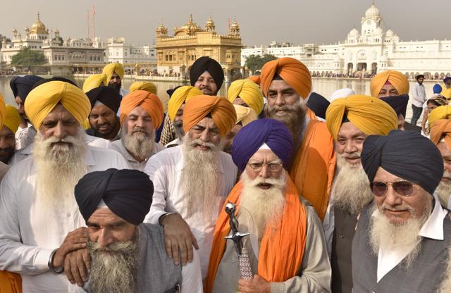 Kirpal Singh Badungar and other elected office-bearers of the SGPC at the Golden Temple, Amritsar, on Saturday. (Gurpreet Singh/HT)