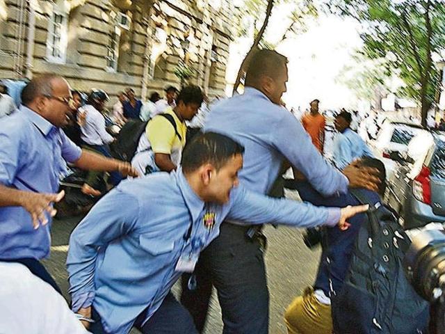 Private security personnel posted outside Tata Group’s global headquarters Bombay House assaulted photojournalists who had assembled ahead of Indian Hotels’ board meeting in Mumbai on Friday(HT Photo)