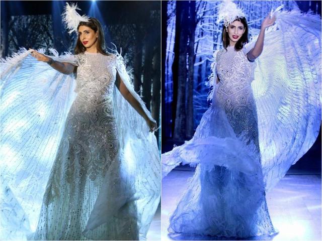 Shweta Bachchan Nanda looked resplendent in a shimmering white gown, an Abu Jani and Sandeep Khosla creation. She accessorised it with a floor-length cape and a feathered headgear. No jewellery, loose hair and red lips were in sharp contrast to her extravagant clothing, and worked well in keeping her look from getting over-the-top. 