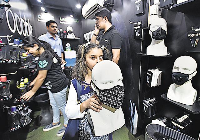 People buying masks at Khan Market in New Delhi on Thursday. (Raj K Raj/Hindustan Times) People buying masks at Khan Market in New Delhi on Thursday. (Raj K Raj/Hindustan Times)