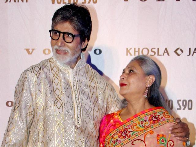 Bollywood star-couple Amitabh Bachchan and Jaya Bachchan share a candid moment during the event.  (PTI) 