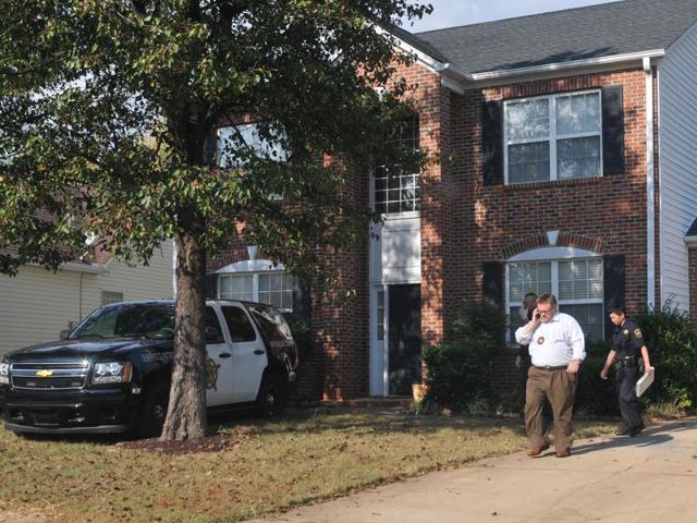 In this Nov 3 photo, registered sex offender Todd Christopher Kohlhepp's home is searched by Spartanburg County Sheriff's deputies and his vehicles are impounded in Moore. (AP) In this Nov 3 photo, registered sex offender Todd Christopher Kohlhepp's home is searched by Spartanburg County Sheriff's deputies and his vehicles are impounded in Moore. (AP)