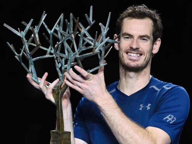 Britain's Andy Murray poses with his trophy on the podium after winning the final tennis match against USA's John Isner. (AFP Photo) Britain's Andy Murray poses with his trophy on the podium after winning the final tennis match against USA's John Isner. (AFP Photo)
