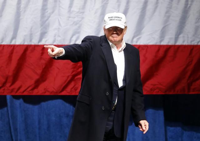 Republican presidential candidate Donald Trump points to the audience at a campaign rally in Sterling Heights, Michigan. (AP Photo) Republican presidential candidate Donald Trump points to the audience at a campaign rally in Sterling Heights, Michigan. (AP Photo)