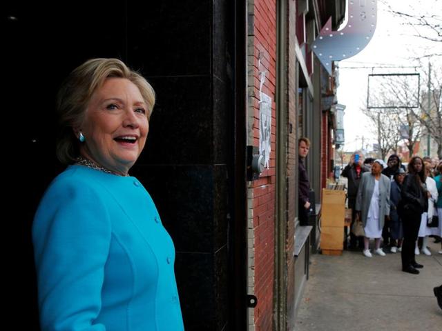 US Democratic presidential nominee Hillary Clinton leaves the Cedar Park Cafe in Philadelphia, Pennsylvania on Sunday. (Reuters) US Democratic presidential nominee Hillary Clinton leaves the Cedar Park Cafe in Philadelphia, Pennsylvania on Sunday. (Reuters)