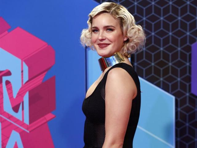 Anne-Marie poses for photographers. She wore a heavy choker to go with her mesh dress. (AP) Anne-Marie poses for photographers. She wore a heavy choker to go with her mesh dress. (AP)