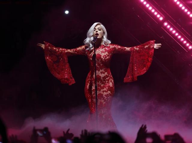 Presenter Bebe Rexha performs during the ceremony in naked red gown. (AP) Presenter Bebe Rexha performs during the ceremony in naked red gown. (AP)