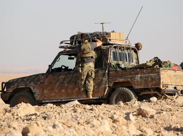 Members of US-backed Kurdish-Arab forces deploy on the frontline, one kilometre from the Syrian town of Ain Issa on Sunday as they launched an offensive on Raqqa. (AFP Photo) Members of US-backed Kurdish-Arab forces deploy on the frontline, one kilometre from the Syrian town of Ain Issa on Sunday as they launched an offensive on Raqqa. (AFP Photo)