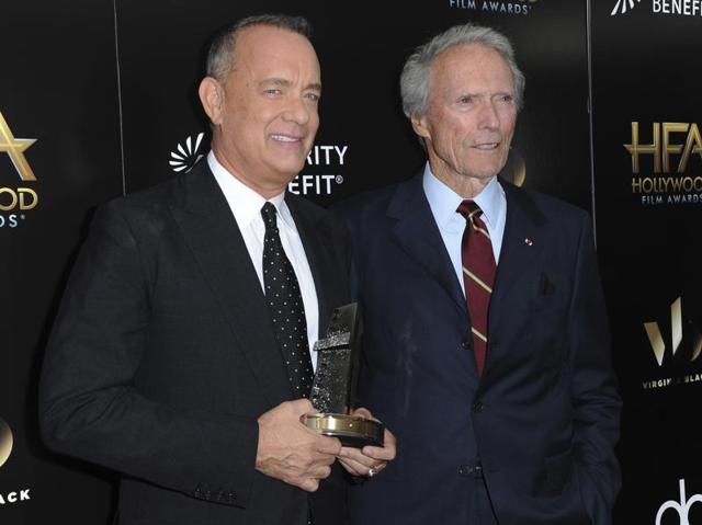 Tom Hanks, left, and Clint Eastwood attend the press room at the 2016 Hollywood Film Awards held at the Beverly Hilton on Sunday. (Richard Shotwell/Invision/AP) 