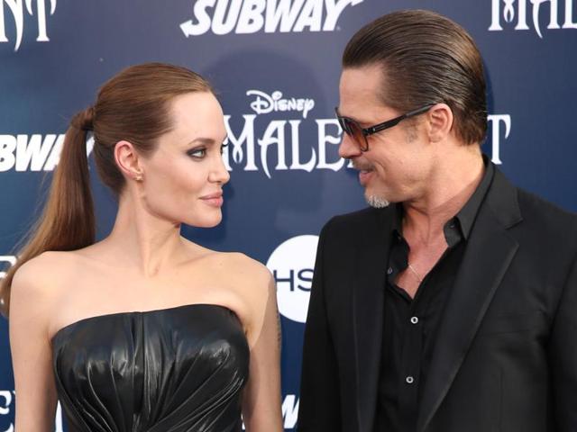 Angelina Jolie and Brad Pitt arrive at the world premiere of Maleficent in Los Angeles.(AP)