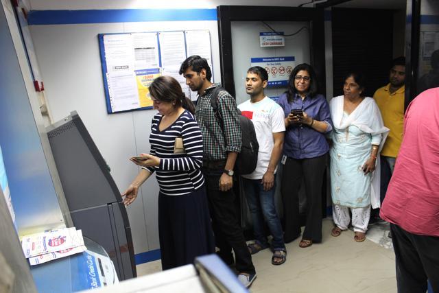 Another crowded ATM in Noida. (Burhaan Kinu/HT Photo) Another crowded ATM in Noida. (Burhaan Kinu/HT Photo)