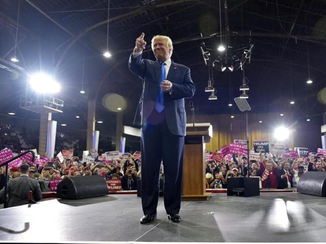 Republican presidential nominee Donald Trump first joined the Republican Party in 1987. He quit the party two years later and returned in 2012. Here he arrives for a rally at the National Western Complex in Colorado on November 5, 2016. (AFP Photo)
