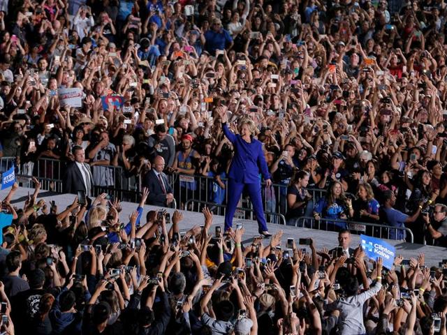 In the White House race, the winner needs at least 270 of the 538 electoral votes up for grabs. Here the US Democratic presidential nominee Hillary Clinton takes the stage at a campaign rally at Arizona State University in Tempe, on November 2, 2016. (REUTERS Photo)