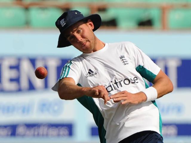 England's Stuart Broad makes a throw during a training session in Rajkot. He will make his 100th appearance for England in the Rajkot Test. (AFP)