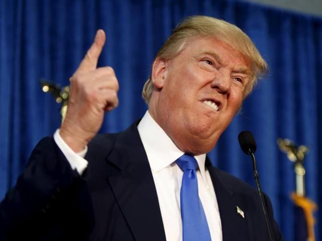 According to a Pew survey 88% of the Republican voters support the party nominee Donald Trump against his Democratic rival Hillary Clinton. In the photo Trump gestures and declares "You're fired!" at a rally in Manchester, New Hampshire. (Reuters photo)