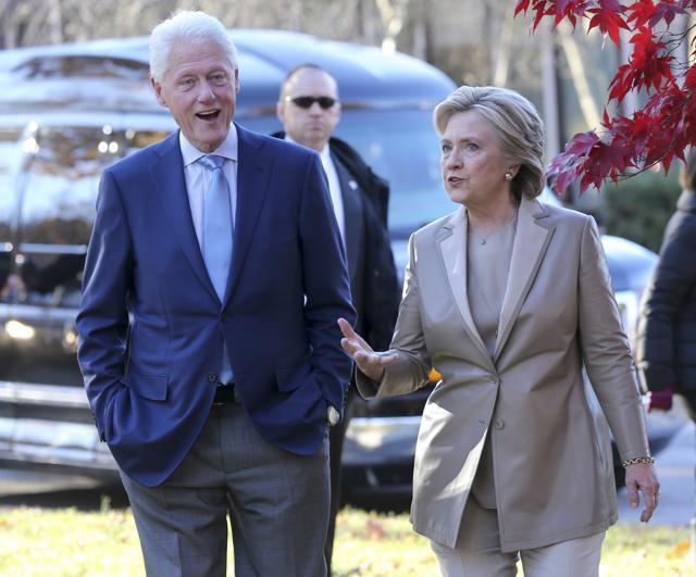 Democratic presidential candidate Hillary Clinton, and her husband former President Bill Clinton, talk after voting in Chappaqua, New York. (AP Photo) Democratic presidential candidate Hillary Clinton, and her husband former President Bill Clinton, talk after voting in Chappaqua, New York. (AP Photo)