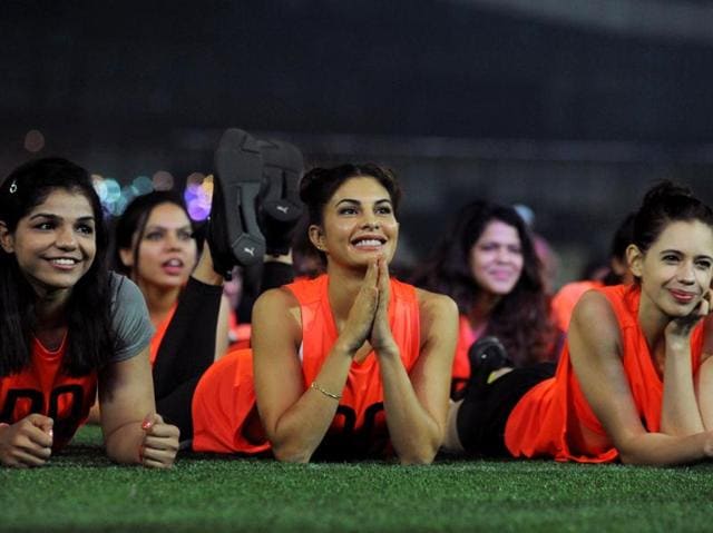 The record attempted was ‘most people holding an abdominal plank at an event.’ (AFP Photo)