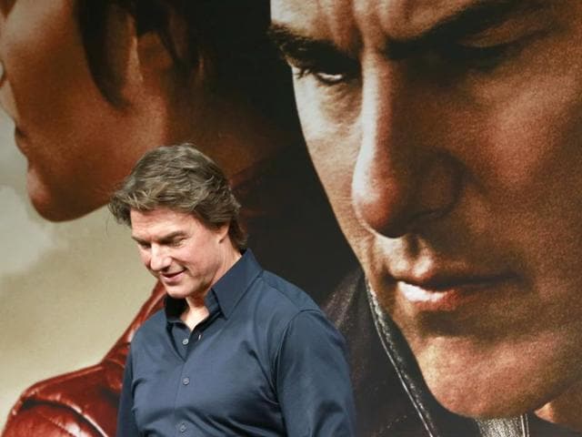 Actor Tom Cruise poses for photographers during a press conference to promote their latest movie Jack Reacher: Never Go Back in Tokyo. (AP)