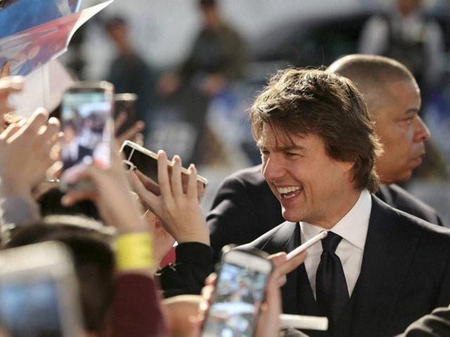 Actor Tom Cruise is greeted by his fans upon arrival for a red carpet event to promote his latest movie Jack Reacher: Never Go Back in Seoul, South Korea. (AP) Actor Tom Cruise is greeted by his fans upon arrival for a red carpet event to promote his latest movie Jack Reacher: Never Go Back in Seoul, South Korea. (AP)