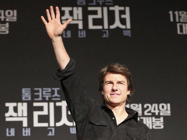 Actor Tom Cruise waves to the audience after finishing a press conference for his new movie Jack Reacher: Never Go Back in Seoul, South Korea. (AP) Actor Tom Cruise waves to the audience after finishing a press conference for his new movie Jack Reacher: Never Go Back in Seoul, South Korea. (AP)