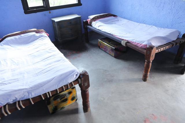 The Village Jewel Eco-lodge runs on 80 per cent solar energy with electricity set aside for emergencies. There are six rooms with traditional twin beds, each with en-suite bathrooms.There are four twin carved traditional rope beds per room. (Manoj Verma/HT Photo)