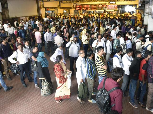 Commuters line up at ticket counters in Mumbai’s Chhatrapati Shivaji Terminus on Wednesday morning. (Kunal Patil) Commuters line up at ticket counters in Mumbai’s Chhatrapati Shivaji Terminus on Wednesday morning. (Kunal Patil)