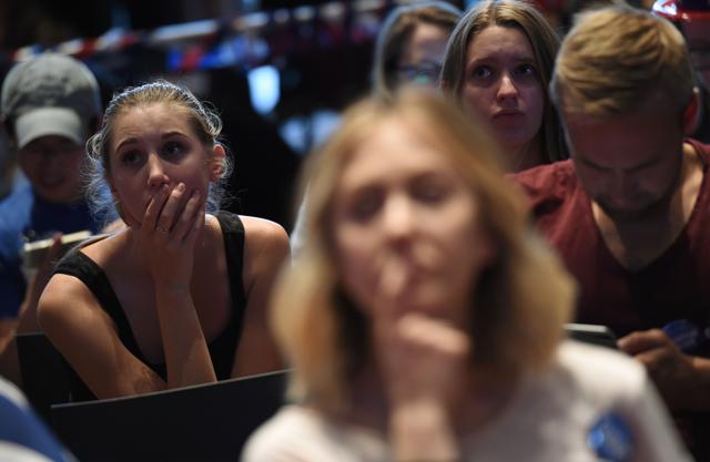 Supporters of US Democratic presidential nominee Hillary Clinton react as they watch results of the US elections come in at the United States Studies Center at the University of Sydney on November 9, 2016. (saeed khan/AFP) Supporters of US Democratic presidential nominee Hillary Clinton react as they watch results of the US elections come in at the United States Studies Center at the University of Sydney on November 9, 2016. (saeed khan/AFP)