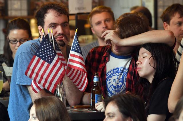 Supporters of US Democratic presidential nominee Hillary Clinton react as they gather to watch elections results at a bar in Sydney. (AFP Photo) Supporters of US Democratic presidential nominee Hillary Clinton react as they gather to watch elections results at a bar in Sydney. (AFP Photo)