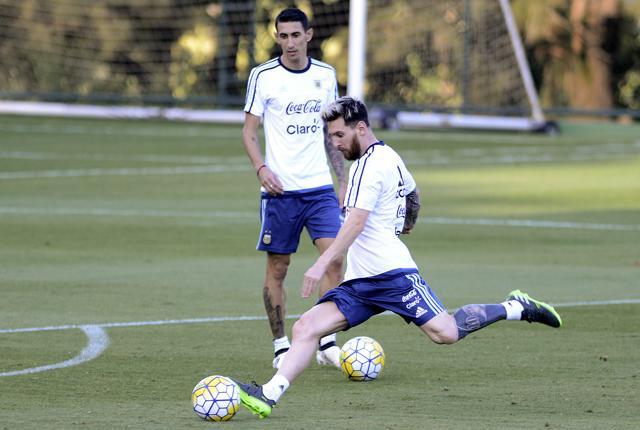 Argentina's Lionel Messi and Angel Di Maria during training in Belo Horizonte. Messi missed last three games for Argentina due to injury. (AP) Argentina's Lionel Messi and Angel Di Maria during training in Belo Horizonte. Messi missed last three games for Argentina due to injury. (AP)
