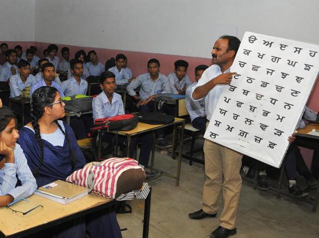 Students attending Punjabi class at GMSSS, Sector 46, in Chandigarh on Tuesday.(Keshav Singh/HT Photo)