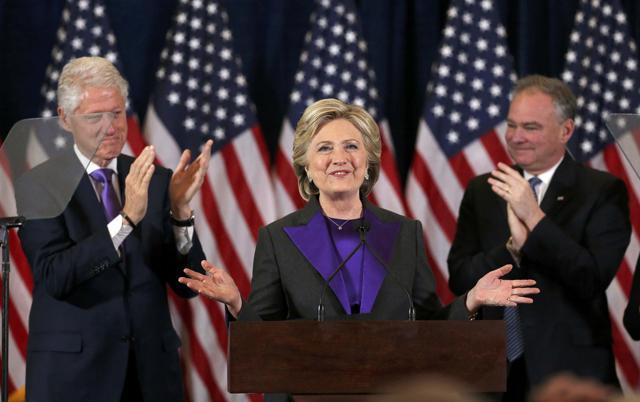 Democratic presidential candidate Hillary Clinton, with her husband, former US President Bill Clinton, (L), and her vice-president running mate Tim Kaine (R), applaud at her concession speech to President-elect Donald Trump in New York, US on Wednesday. (Reuters) Democratic presidential candidate Hillary Clinton, with her husband, former US President Bill Clinton, (L), and her vice-president running mate Tim Kaine (R), applaud at her concession speech to President-elect Donald Trump in New York, US on Wednesday. (Reuters)