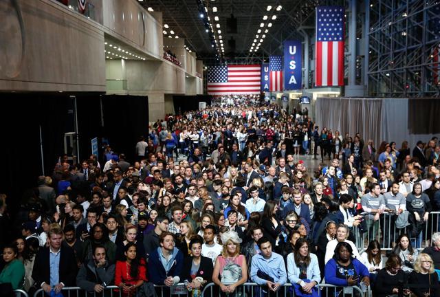 People watch voting results at Democratic presidential nominee former Secretary of State Hillary Clinton's election night event at the Jacob K Javits Convention Center in New York City. (AFP) People watch voting results at Democratic presidential nominee former Secretary of State Hillary Clinton's election night event at the Jacob K Javits Convention Center in New York City. (AFP)