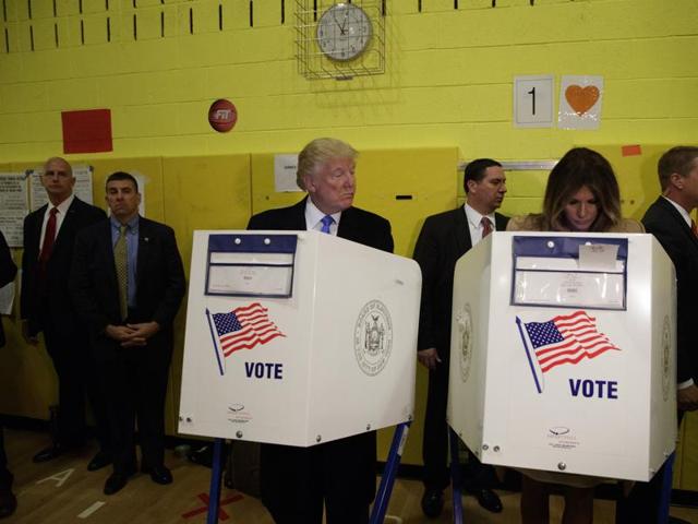 Republican presidential candidate Donald Trump looks at his wife Melania as they cast their votes at PS-59 on November 8. (AP) Republican presidential candidate Donald Trump looks at his wife Melania as they cast their votes at PS-59 on November 8. (AP)