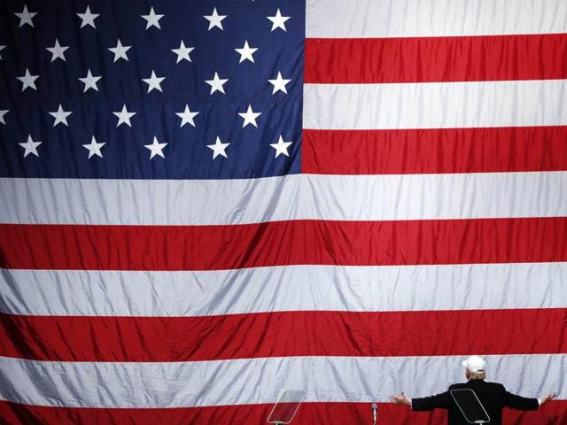 Republican presidential candidate Donald Trump turns to face the US flag at a campaign rally in Sterling Heights, Michigan. (AP File Photo) Republican presidential candidate Donald Trump turns to face the US flag at a campaign rally in Sterling Heights, Michigan. (AP File Photo)