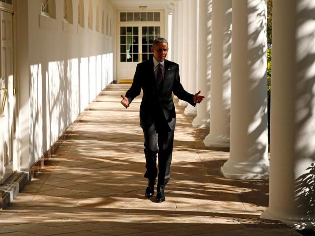 US President Barack Obama gestures as he walks the Colonnade toward the Oval Office of the White House in Washington on Wednesday. (REUTERS) US President Barack Obama gestures as he walks the Colonnade toward the Oval Office of the White House in Washington on Wednesday. (REUTERS)