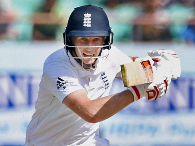 England's Joe Root (L) pumps fists with teammate Moeen Ali on the first day of the first Test cricket match between Indian and England. (AFP Photo) England's Joe Root (L) pumps fists with teammate Moeen Ali on the first day of the first Test cricket match between Indian and England. (AFP Photo)