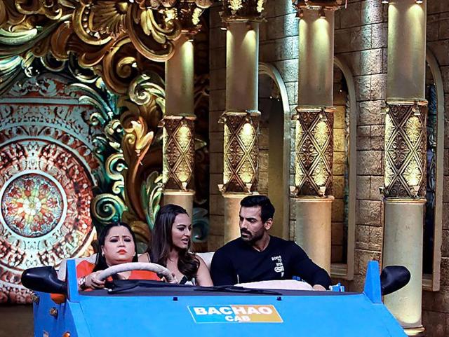 Bharti invited John and Sonakshi for a ride on the sets. (AFP Photo)
