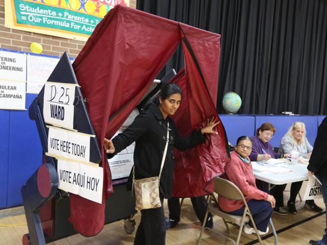 Indian American voters casting their votes in Jersey city, New Jersey on Tuesday. (PTI Photo) Indian American voters casting their votes in Jersey city, New Jersey on Tuesday. (PTI Photo)