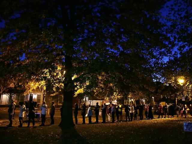 Voters wait in-line for casting their ballots outside a polling place on Election Day November 8, 2016 in Alexandria, Virginia. Americans across the nation are picking their choice for the next president of the United States. (AFP) Voters wait in-line for casting their ballots outside a polling place on Election Day November 8, 2016 in Alexandria, Virginia. Americans across the nation are picking their choice for the next president of the United States. (AFP)