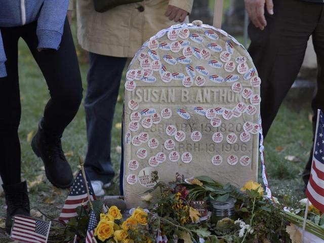 People visit the grave of women's suffrage leader Susan B. Anthony on US election day at Mount Hope Cemetery in Rochester, New York on November 8, 2016. (REUTERS) People visit the grave of women's suffrage leader Susan B. Anthony on US election day at Mount Hope Cemetery in Rochester, New York on November 8, 2016. (REUTERS)