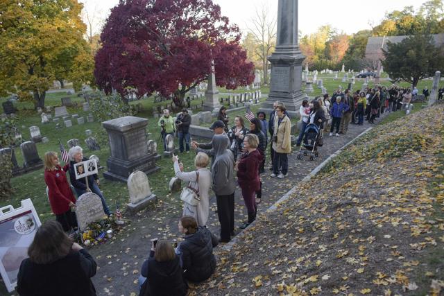 People line up to visit the grave of women's suffrage leader Susan B Anthony on US election day at Mount Hope Cemetery in Rochester. (REUTERS)