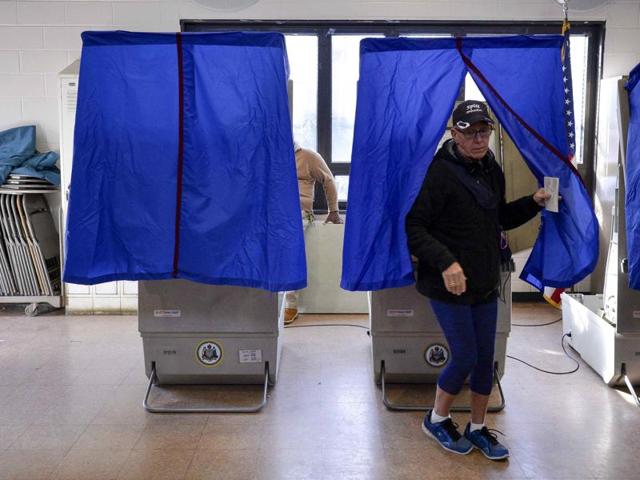 A voter leaves the polling booth during the U.S. presidential election in Philadelphia, Pennsylvania. (REUTERS) A voter leaves the polling booth during the U.S. presidential election in Philadelphia, Pennsylvania. (REUTERS)