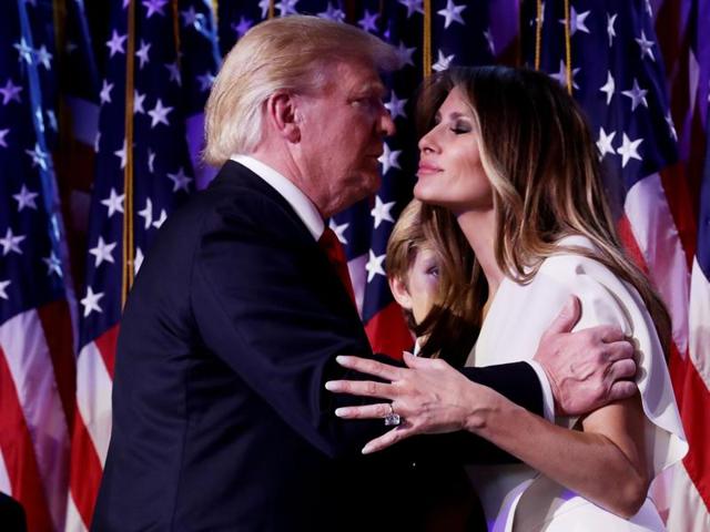 Republican president-elect Donald Trump embraces his wife Melania Trump during his election night event at the New York Hilton Midtown in the early morning hours of November 9.(AFP)