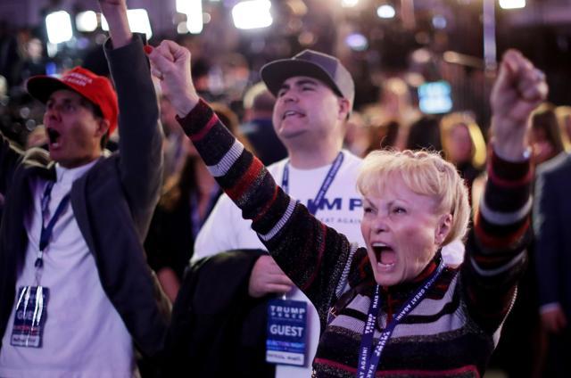 Carol Minor cheers during Republican presidential nominee Donald Trump election night event at the New York Hilton Midtown in New York City. (AFP Photo) Carol Minor cheers during Republican presidential nominee Donald Trump election night event at the New York Hilton Midtown in New York City. (AFP Photo)