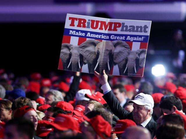 A supporter holds up a sign in support of Republican presidential nominee Donald Trump during the election night event at the New York Hilton Midtown on November 8, 2016 in New York City. (spencer platt/getty) A supporter holds up a sign in support of Republican presidential nominee Donald Trump during the election night event at the New York Hilton Midtown on November 8, 2016 in New York City. (spencer platt/getty)