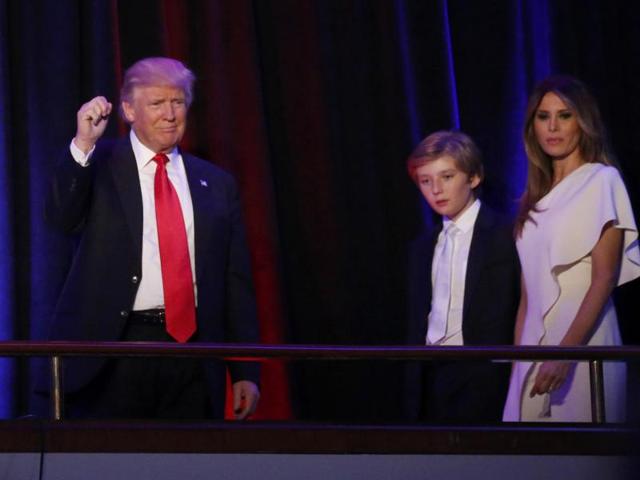 In this file photo, Trump arrives to speak at his election night rally with his son Barron and Melania in Manhattan, New York.(REUTERS)