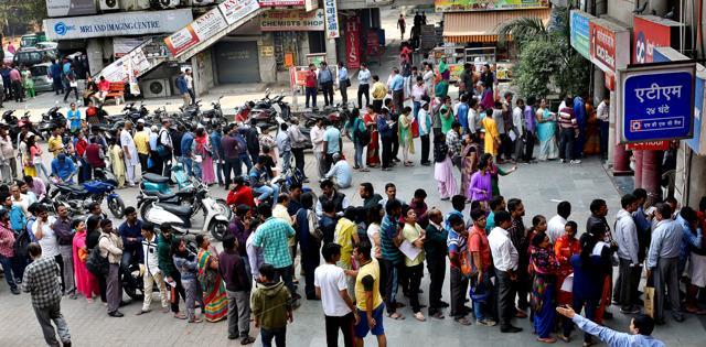 Bank customers queue outside ICICI bank and HDFC bank in New Delhi. (Ajay Aggarwal/HT PHOTO) Bank customers queue outside ICICI bank and HDFC bank in New Delhi. (Ajay Aggarwal/HT PHOTO)