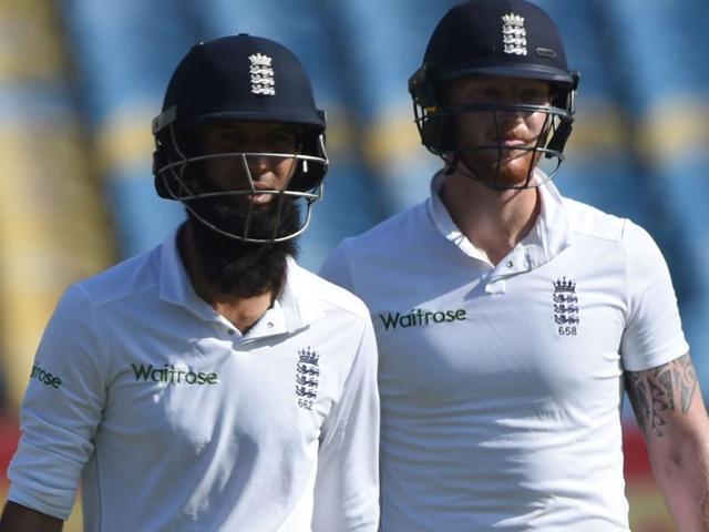 England's Ben Stokes (L) and Moeen Ali walk off the pitch. (AFP Photo) England's Ben Stokes (L) and Moeen Ali walk off the pitch. (AFP Photo)