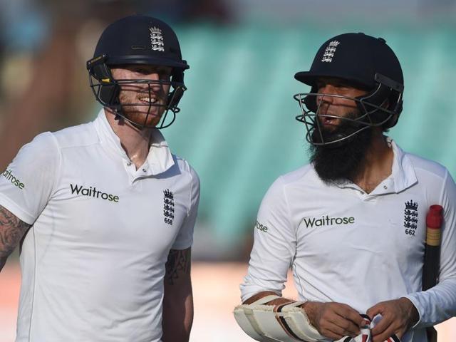 England's Moeen Ali (L) walks past teammate Ben Stokes.(AFP Photo)