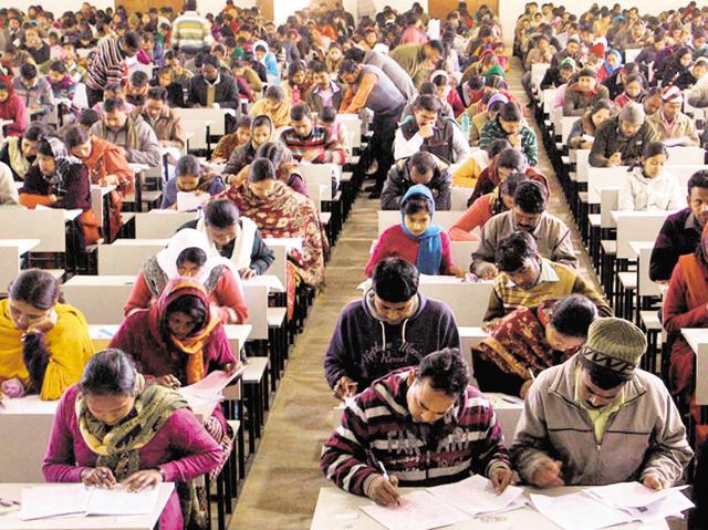 Candidates appearing for the Jharkhand Teachers’ Eligibility Test (JTET) at a centre in Ranchi on Thursday.) Candidates appearing for the Jharkhand Teachers’ Eligibility Test (JTET) at a centre in Ranchi on Thursday.)